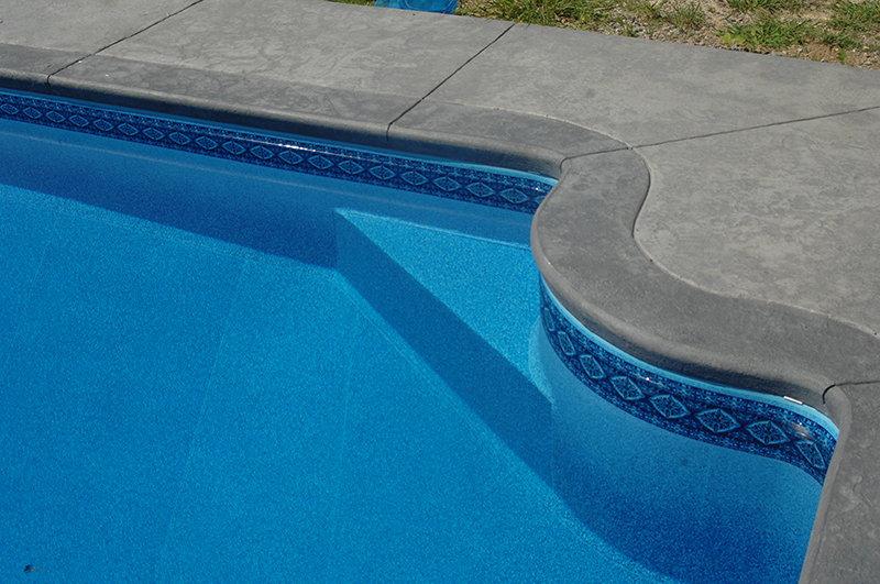 Swimming pool and stamped concrete project example 102